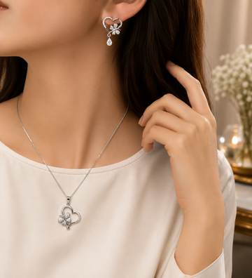 Butterfly Heart Pendant Earrings Silver Set worn by model