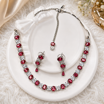 Elegant Ruby Red Diamond Cut Necklace Earrings Set worn by model