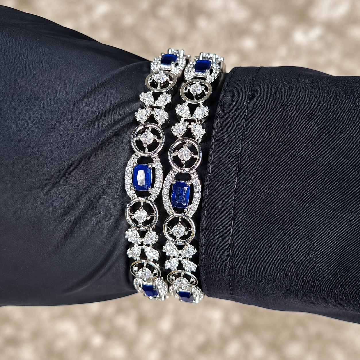 Diamond Cut Royal Blue Sapphire Bangles Size 2.8 close up on wrist
