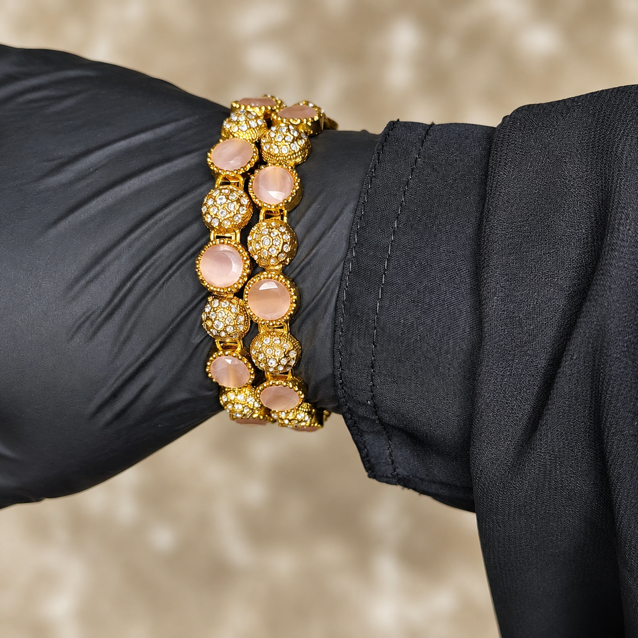 Beautiful 1 Carat Gold Pink Opal Bangles worn by model